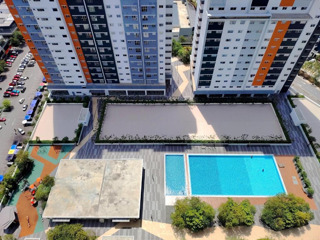 Πισίνα στο ή κοντά στο Aurora's Place at Alanis Residence