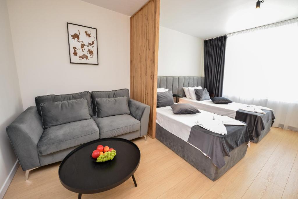 One by One - by Grand Accommodation - 