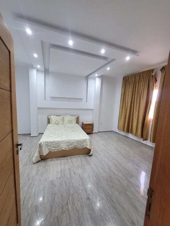 Postel nebo postele na pokoji v ubytování Ras Jebel appartements