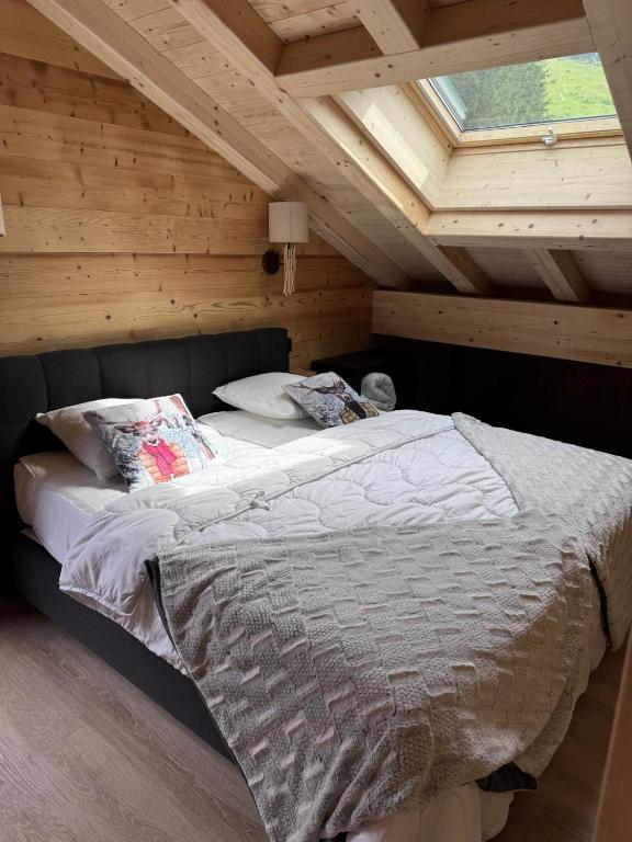 Postel nebo postele na pokoji v ubytování La Rose des neiges à Châtel