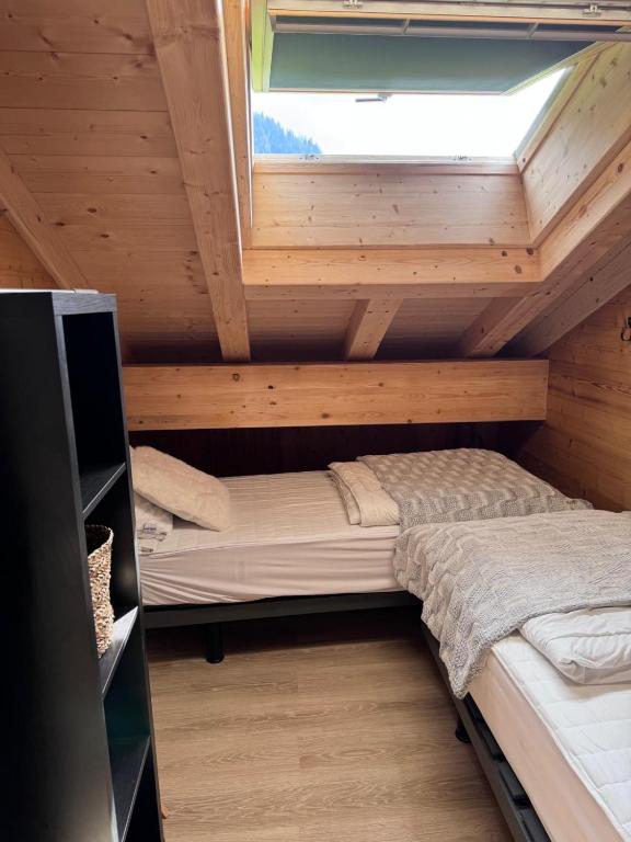 Postel nebo postele na pokoji v ubytování La Rose des neiges à Châtel