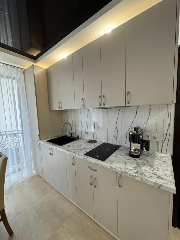 Kuchyň nebo kuchyňský kout v ubytování Guest Apart Polyana