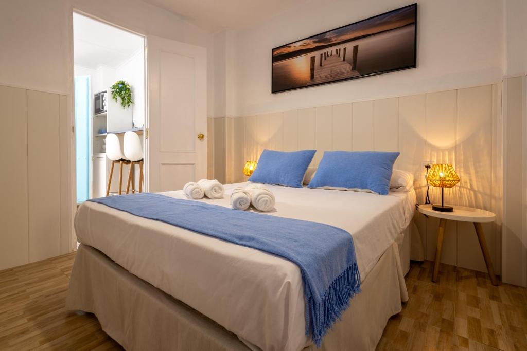 Postel nebo postele na pokoji v ubytování La casita de la abuela