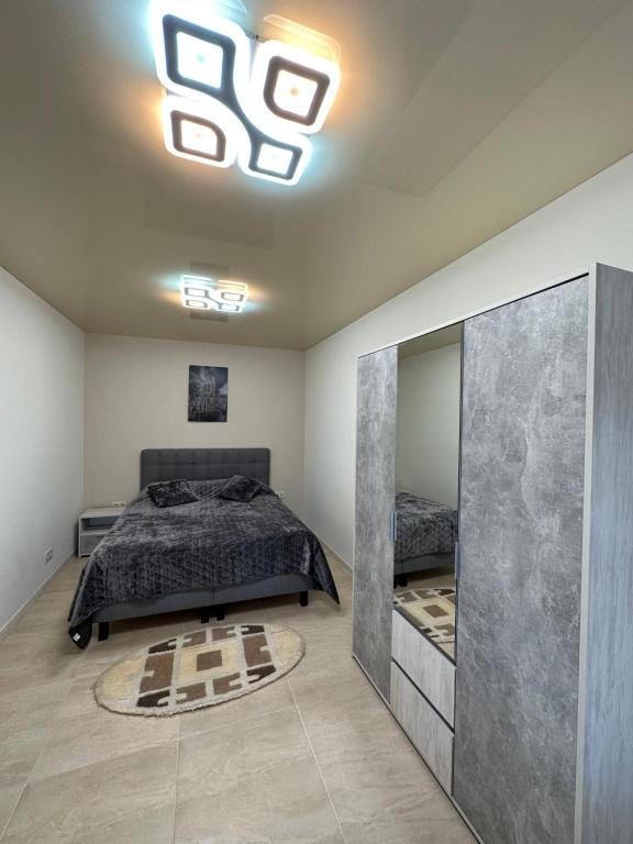 Postel nebo postele na pokoji v ubytování Guest Apart Polyana