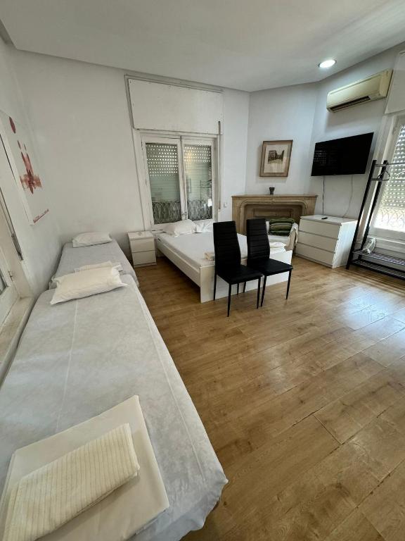 Postel nebo postele na pokoji v ubytování Torreon Sol Apartment