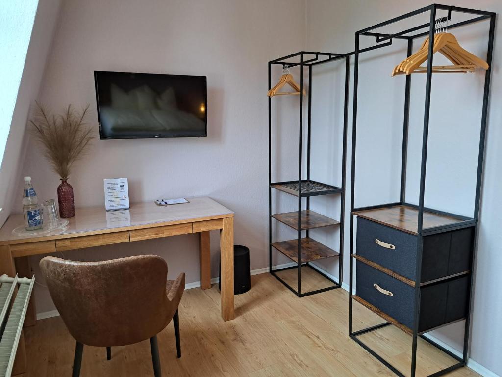 TV a/nebo společenská místnost v ubytování Hotel zum Hirsch