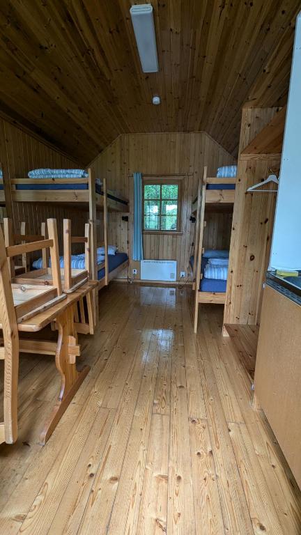 Postel nebo postele na pokoji v ubytování Stenbräcka Camping