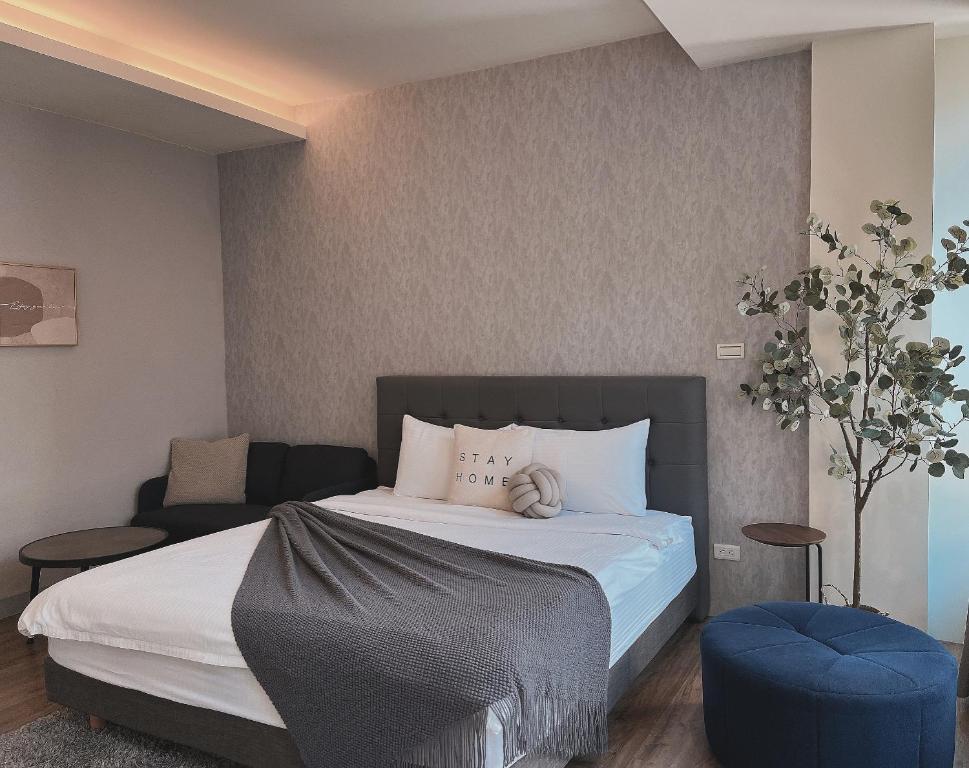 Postel nebo postele na pokoji v ubytování Minilove Homestay