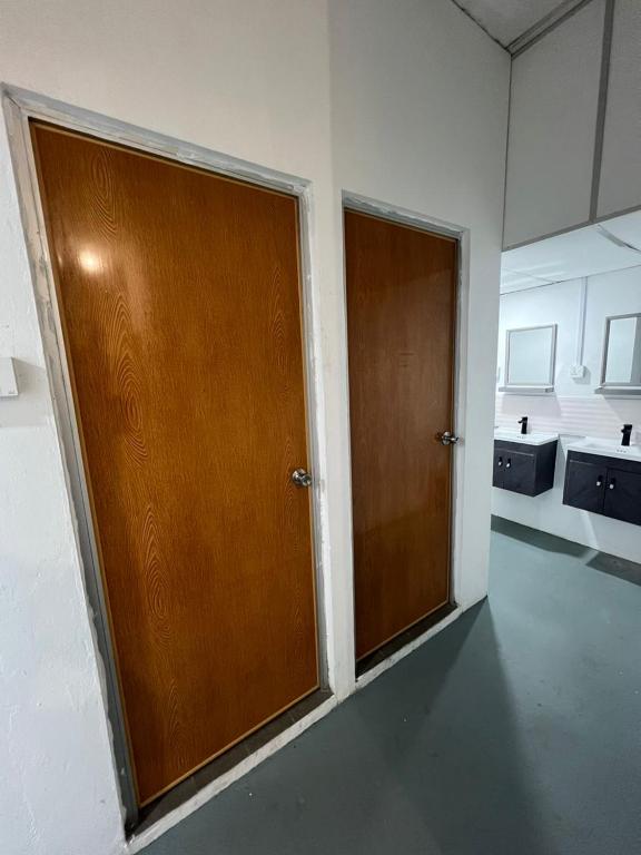 Postel nebo postele na pokoji v ubytování AeCOTEL Mingle Hostel