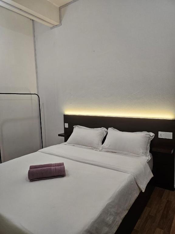 Postel nebo postele na pokoji v ubytování AeCOTEL Mingle Hostel