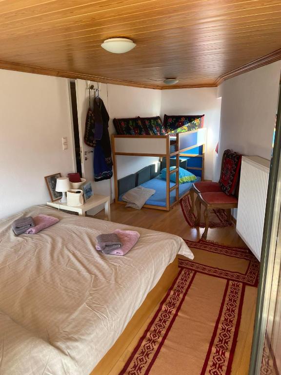 Postel nebo postele na pokoji v ubytování Kostis Central Loft