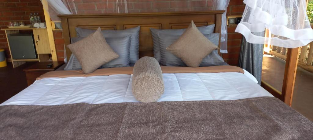 Postel nebo postele na pokoji v ubytování Felicity Inn