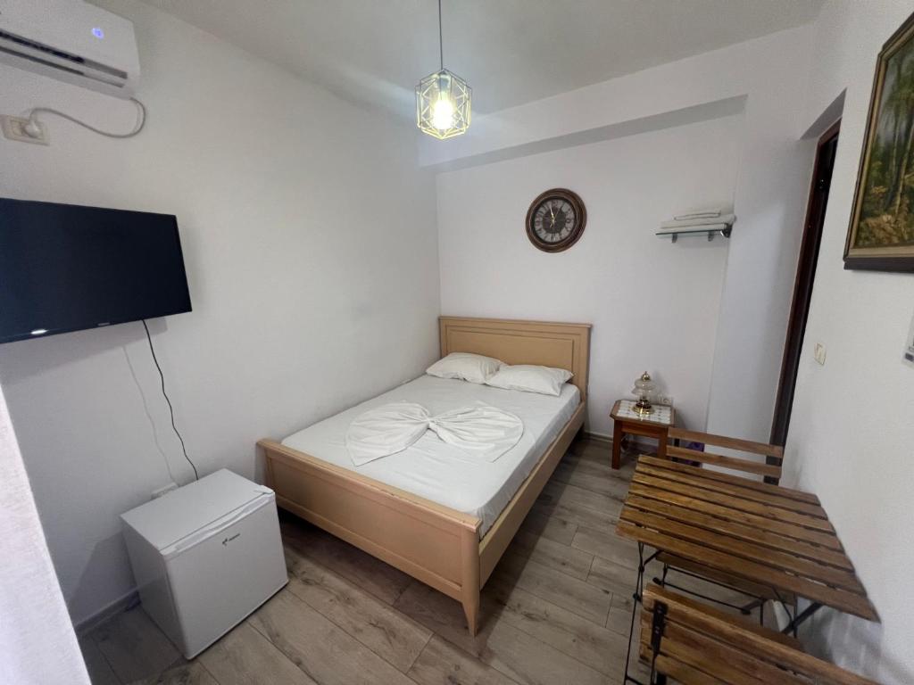 Postel nebo postele na pokoji v ubytování Room Click inn