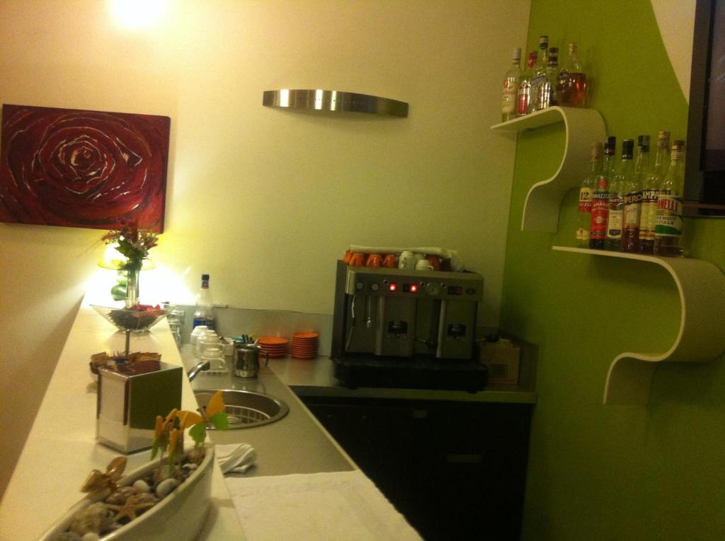 Nápoje v ubytování Hotel Milano