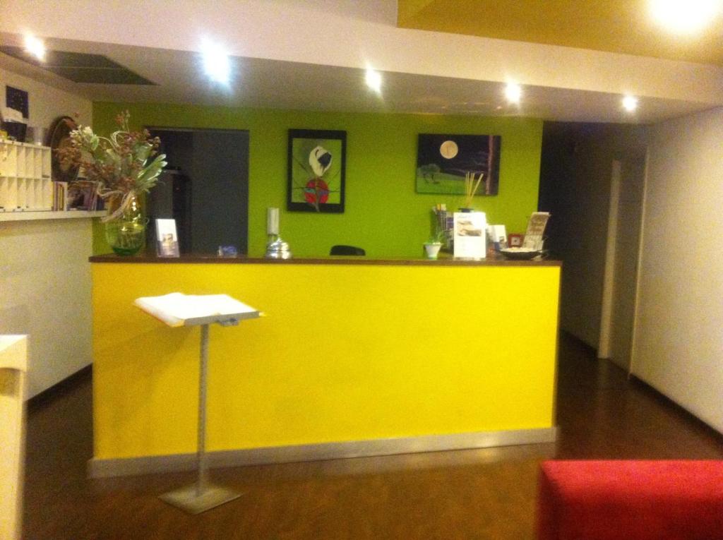 TV a/nebo společenská místnost v ubytování Hotel Milano