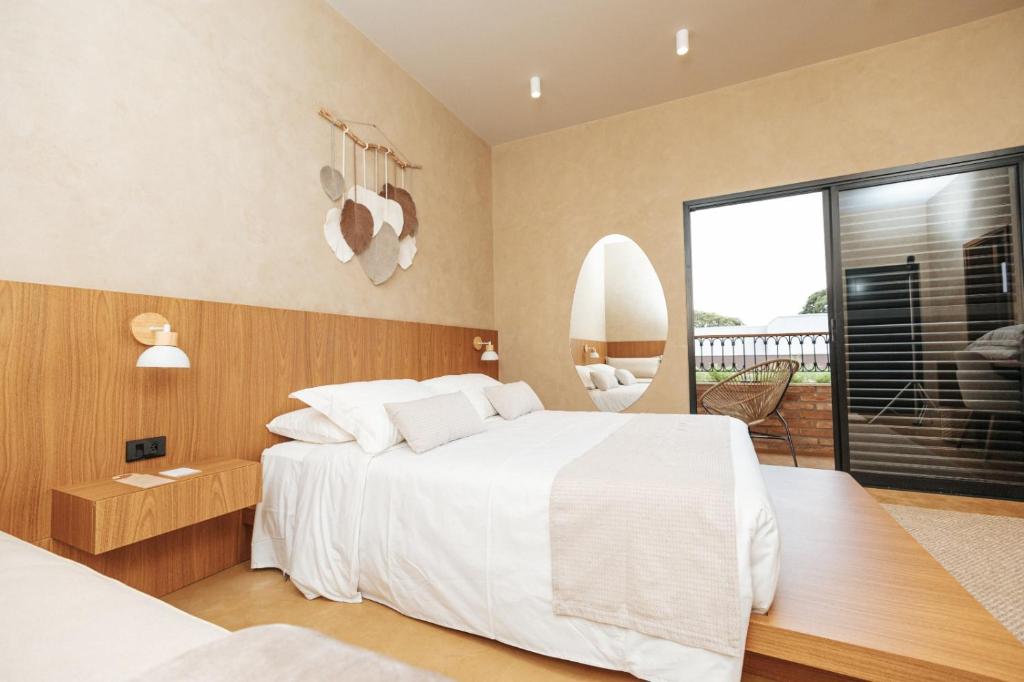 Postel nebo postele na pokoji v ubytování Villa Nova Hotel