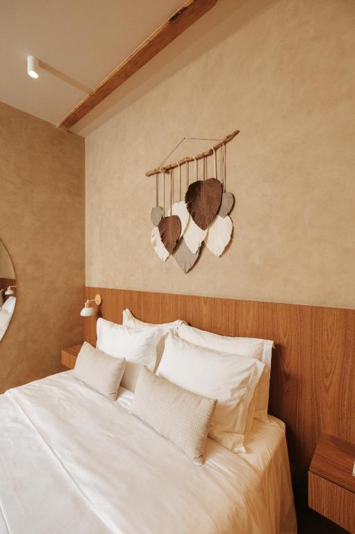Postel nebo postele na pokoji v ubytování Villa Nova Hotel