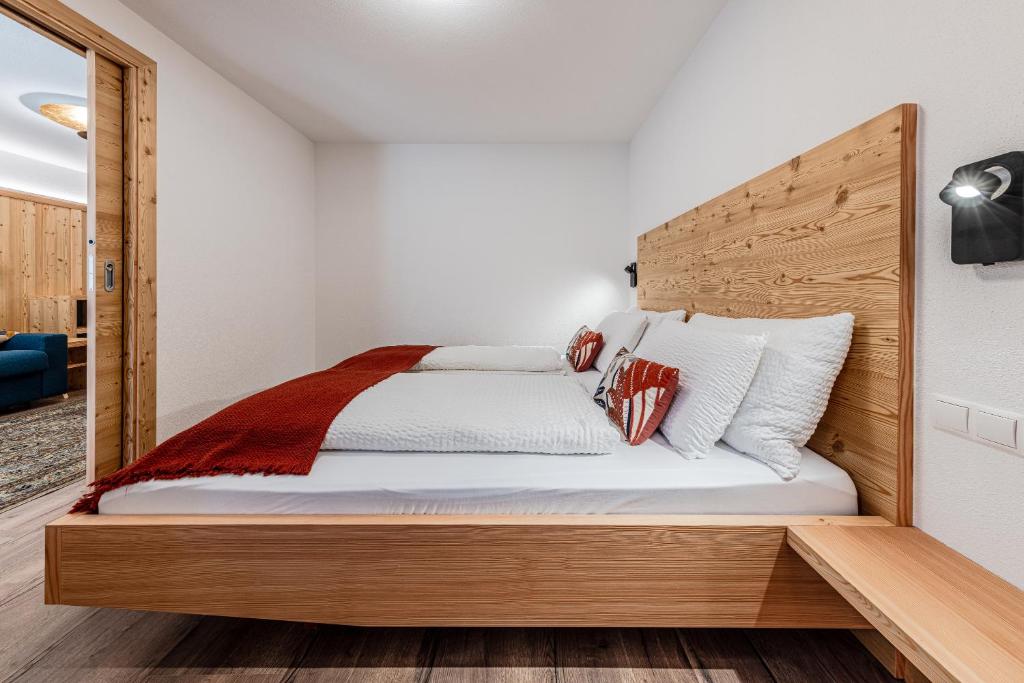 Postel nebo postele na pokoji v ubytování Appartamenti Residence Ada