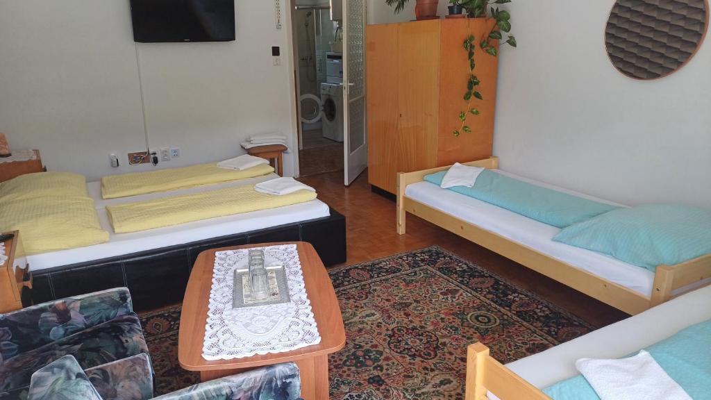 Postel nebo postele na pokoji v ubytování OPEN Vendégház