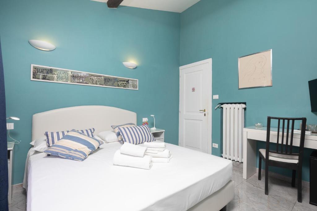 Posteľ alebo postele v izbe v ubytovaní Hotel Jolì
