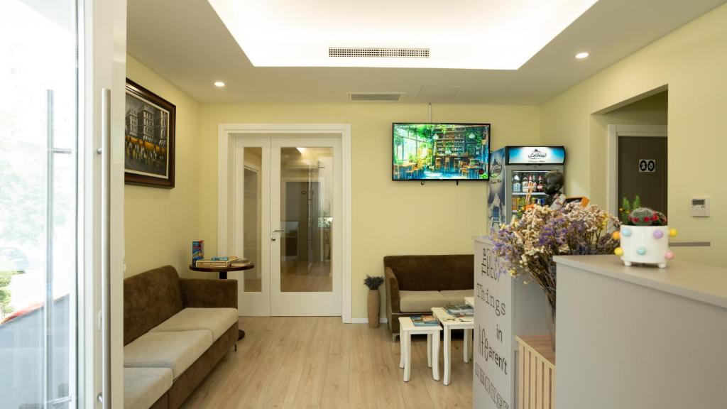 TV a/nebo společenská místnost v ubytování F&M Hotel 2