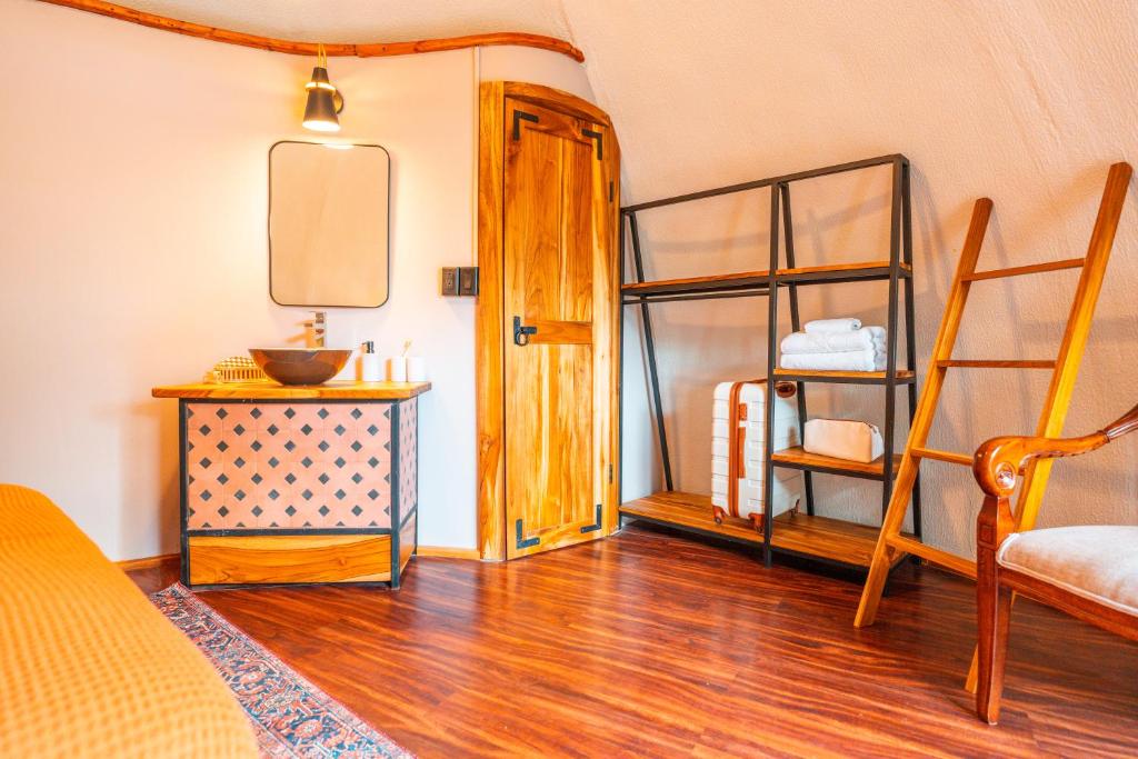 Ein Bett oder Betten in einem Zimmer der Unterkunft Bambuda Castle