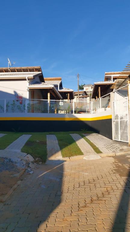 a large boat is parked next to a building at Pousada do Barao in Cunha