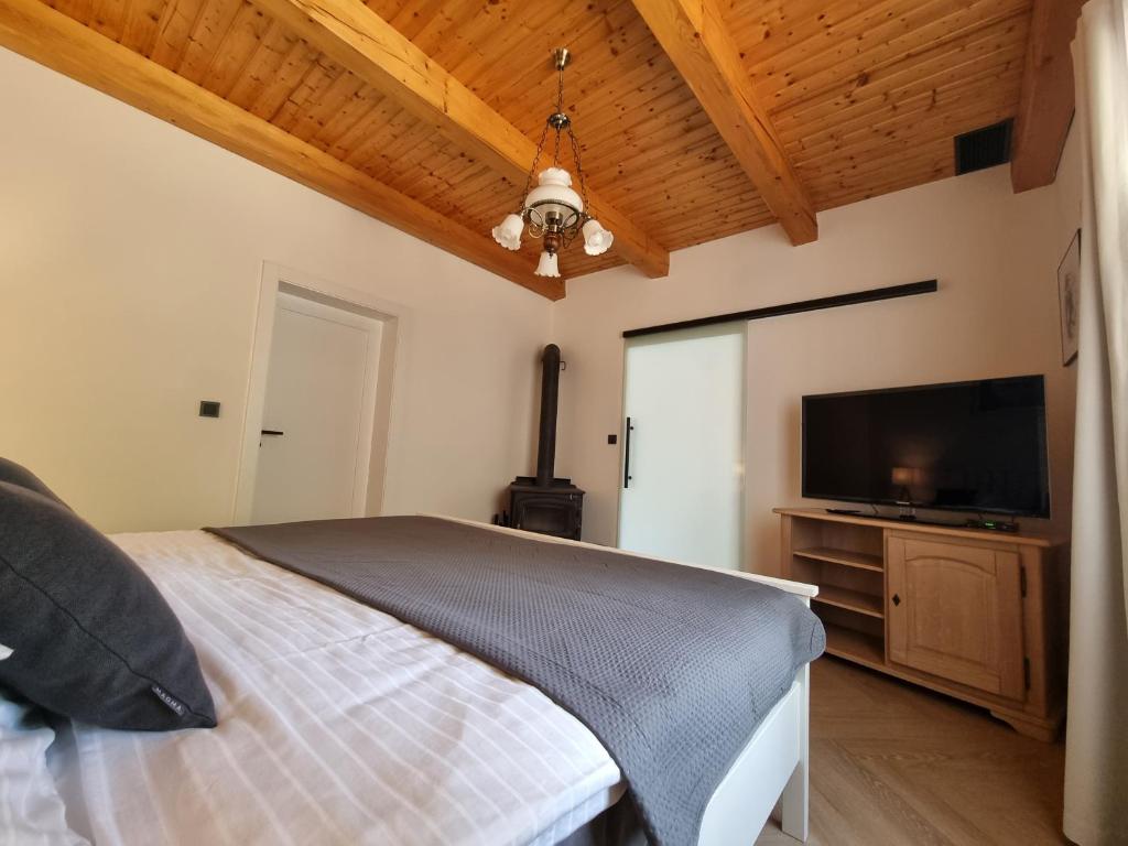 Postel nebo postele na pokoji v ubytování Penzion Osika