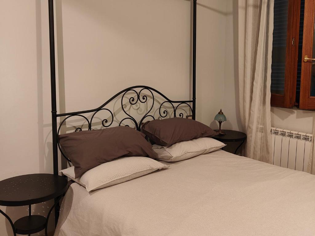 Postel nebo postele na pokoji v ubytování Il Melarancio B&B
