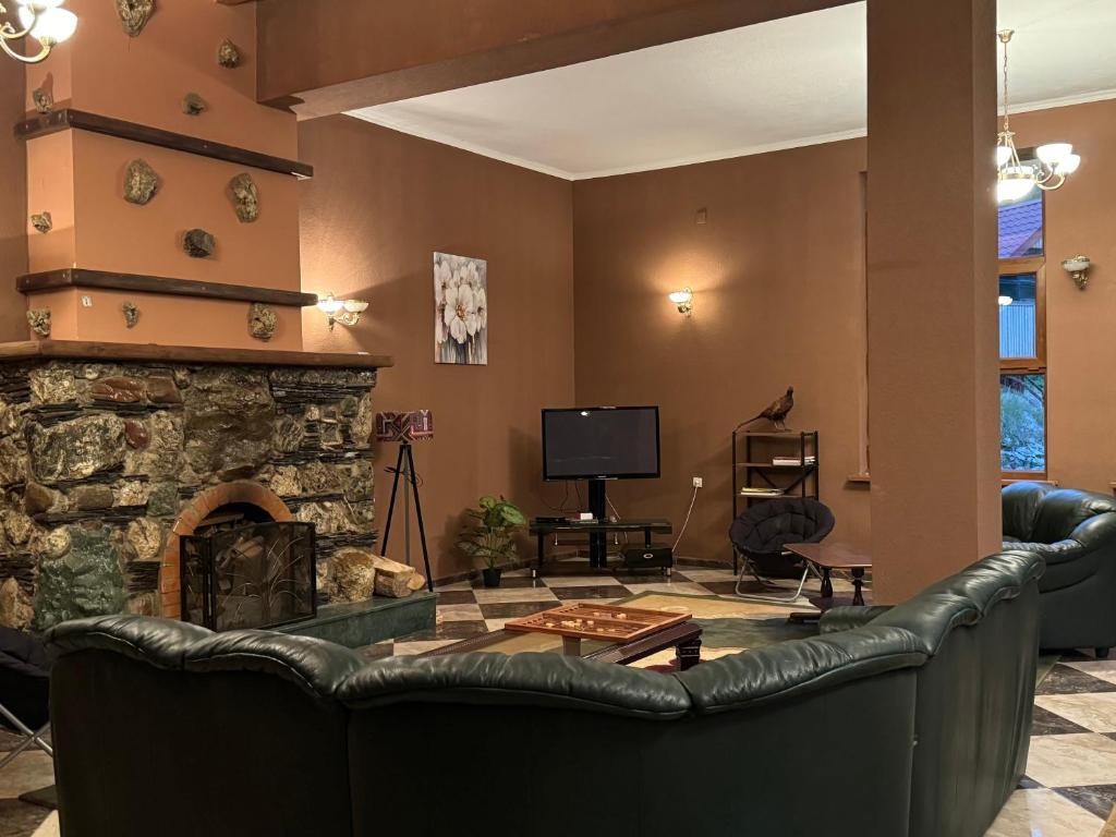 TV a/nebo společenská místnost v ubytování Juta Guest House