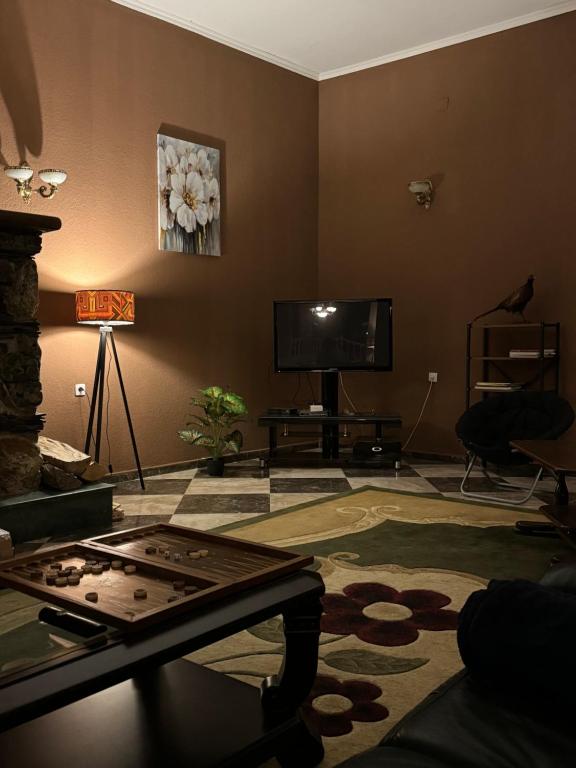 TV a/nebo společenská místnost v ubytování Juta Guest House