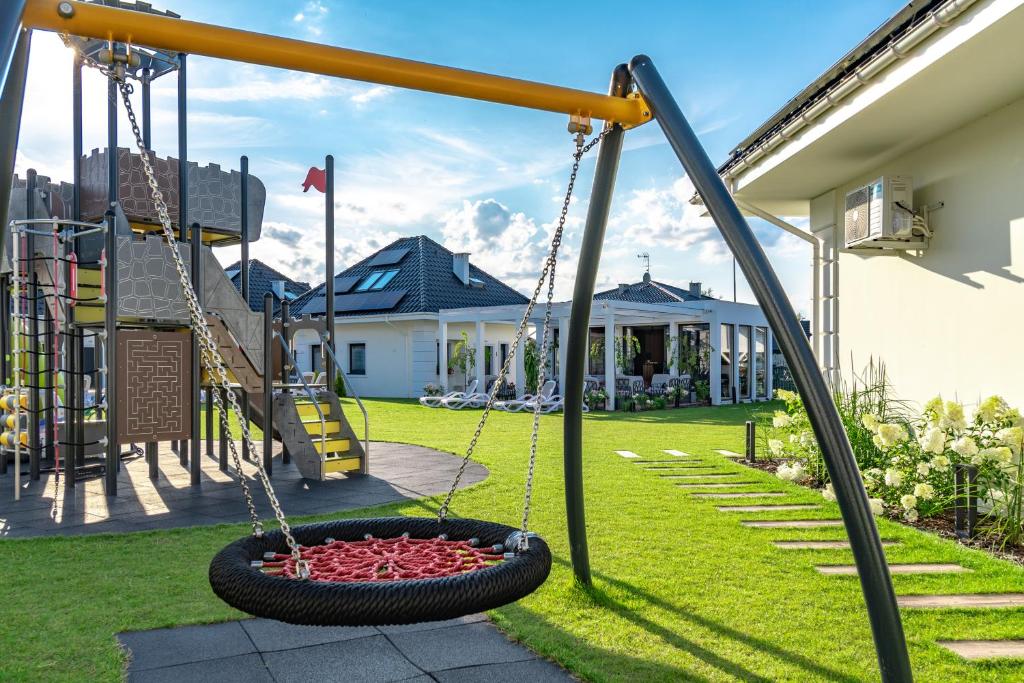 Zahrada ubytování Family Resort Ustka - Domki dwupoziomowe z basenem