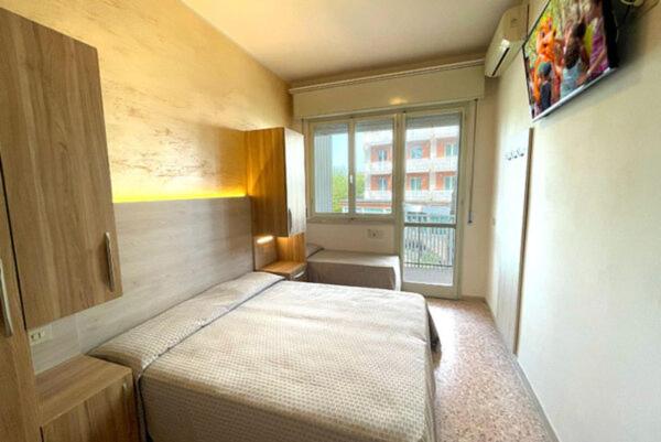 Postel nebo postele na pokoji v ubytování Hotel Cinzia