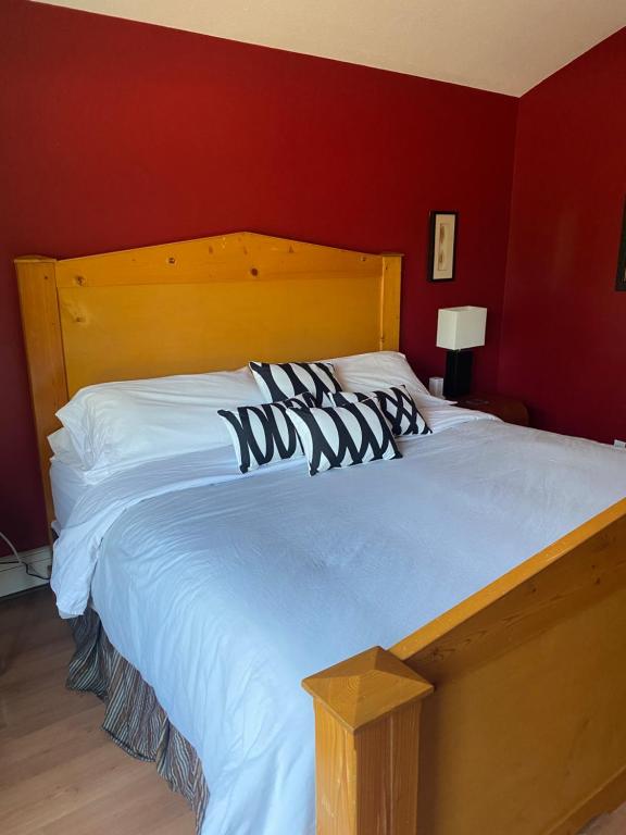 Postel nebo postele na pokoji v ubytování Rose Cottage Bed & Breakfast