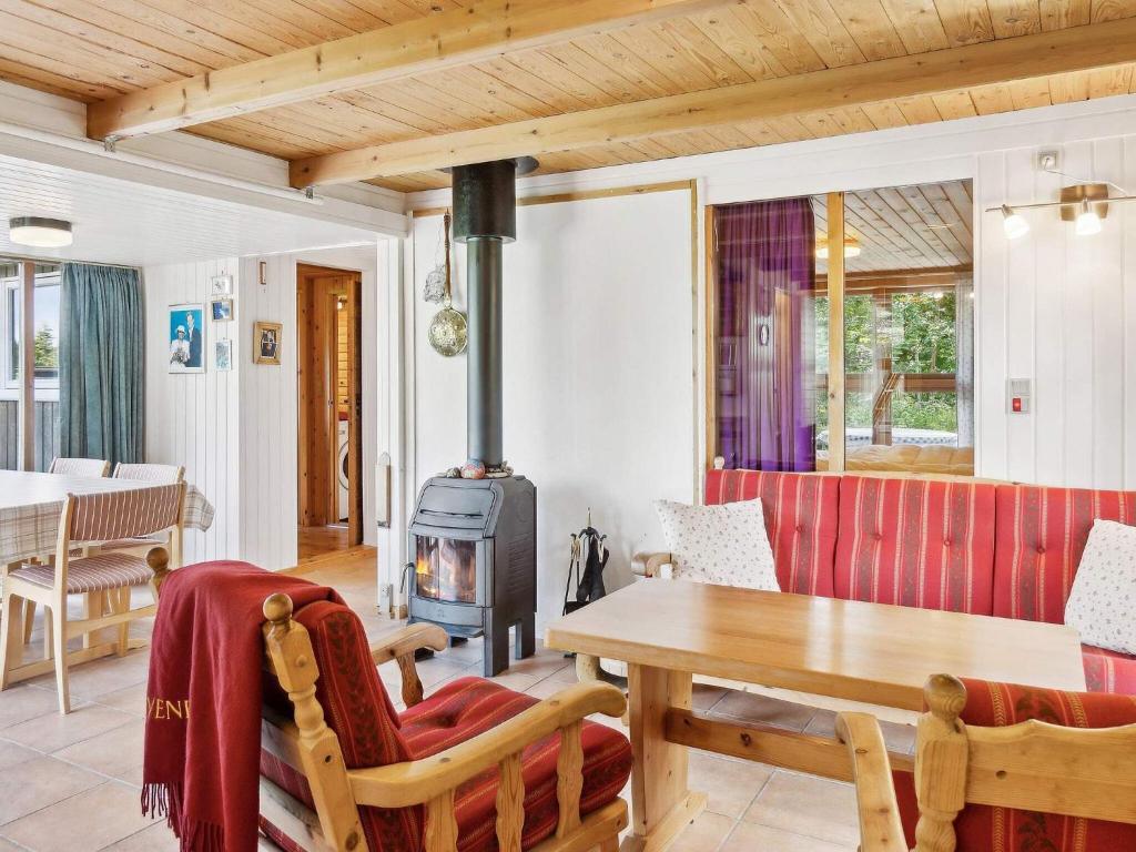 Posezení v ubytování 7 person holiday home in Kolind-By Traum