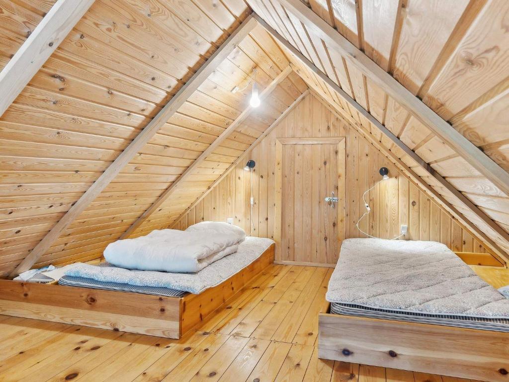 Postel nebo postele na pokoji v ubytování 7 person holiday home in Kolind-By Traum