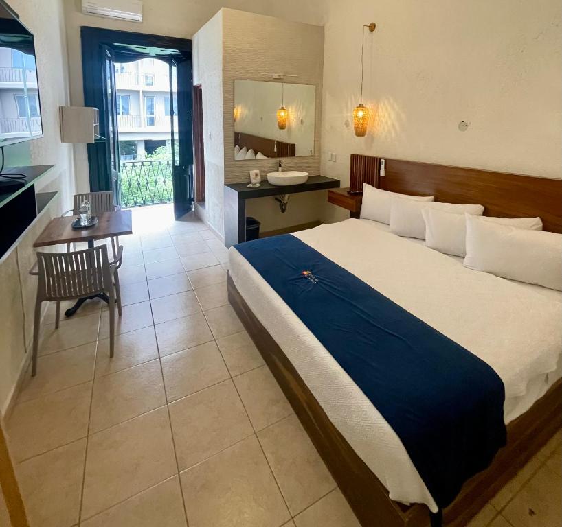 Postel nebo postele na pokoji v ubytování Hotel Real de Castilla Nuovo