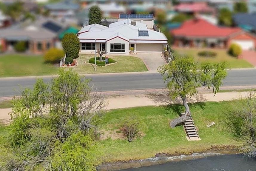 a model of a house on the side of a road at Lakefront Beauty ! Pet friendly in Yarrawonga