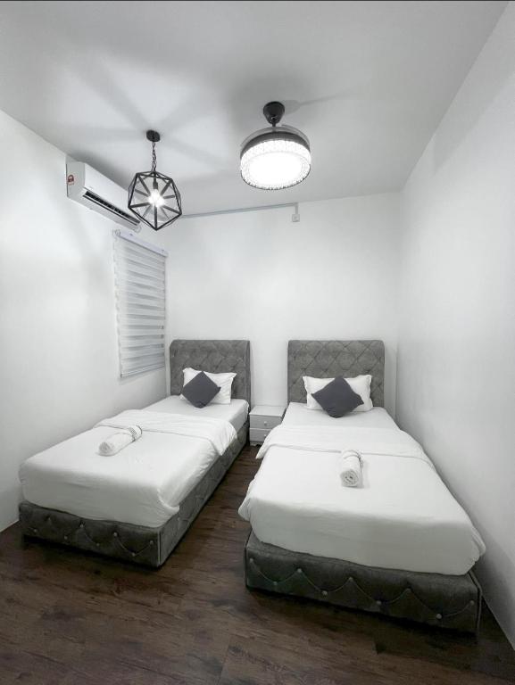 Postel nebo postele na pokoji v ubytování SDC Suite Home