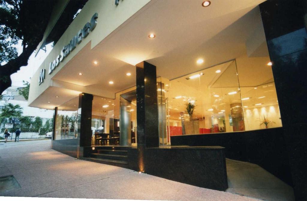 a store front of a building with a store at Los Sauces Hotel & Spa in Villa Carlos Paz