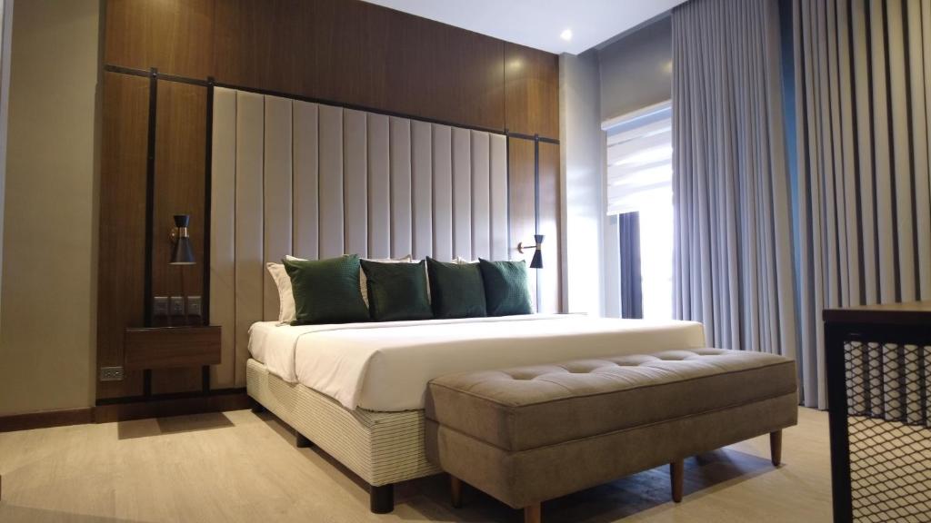 Postel nebo postele na pokoji v ubytování Acro Residences