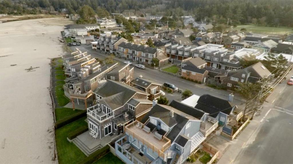 an aerial view of a house next to the beach at The Waves in Cannon Beach