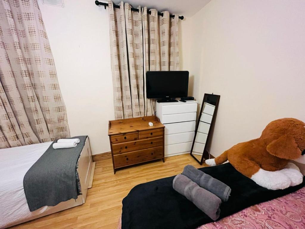 TV a/nebo společenská místnost v ubytování Dormitorio Grande D08