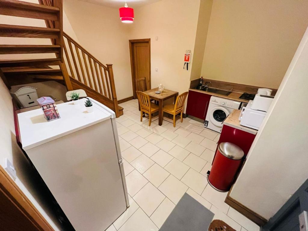 Posezení v ubytování Dormitorio Grande D08