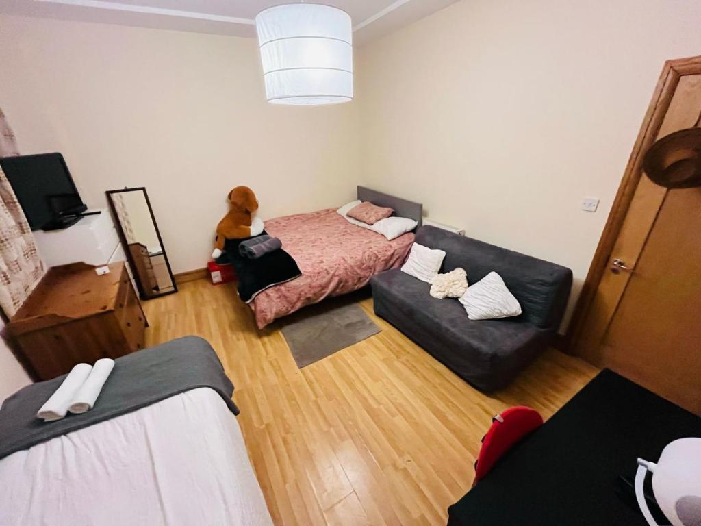 Postel nebo postele na pokoji v ubytování Dormitorio Grande D08