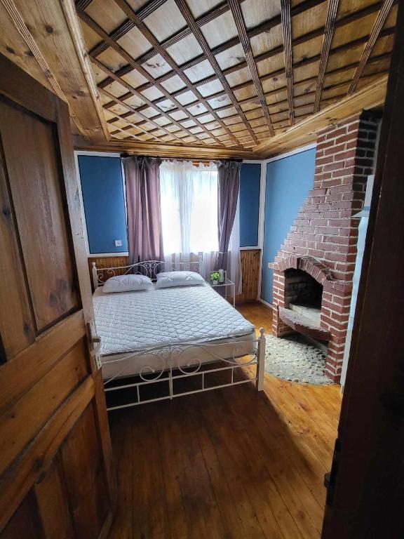 Postel nebo postele na pokoji v ubytování OldHouse