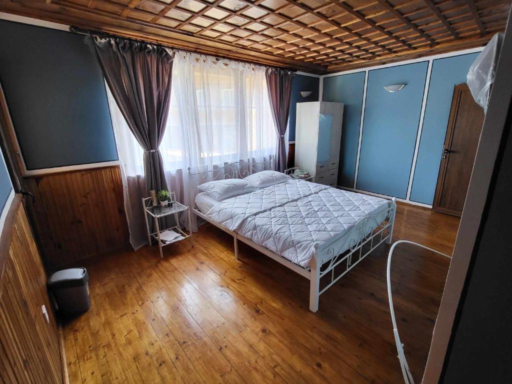Postel nebo postele na pokoji v ubytování OldHouse