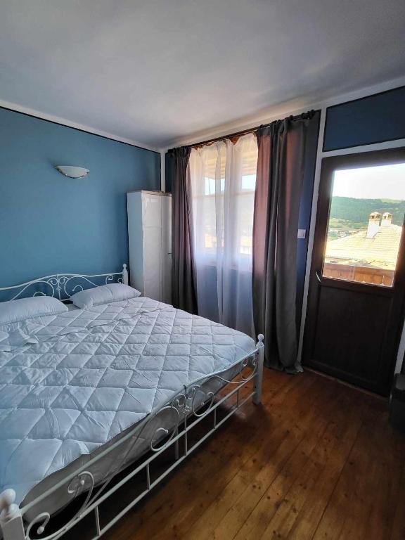 Postel nebo postele na pokoji v ubytování OldHouse
