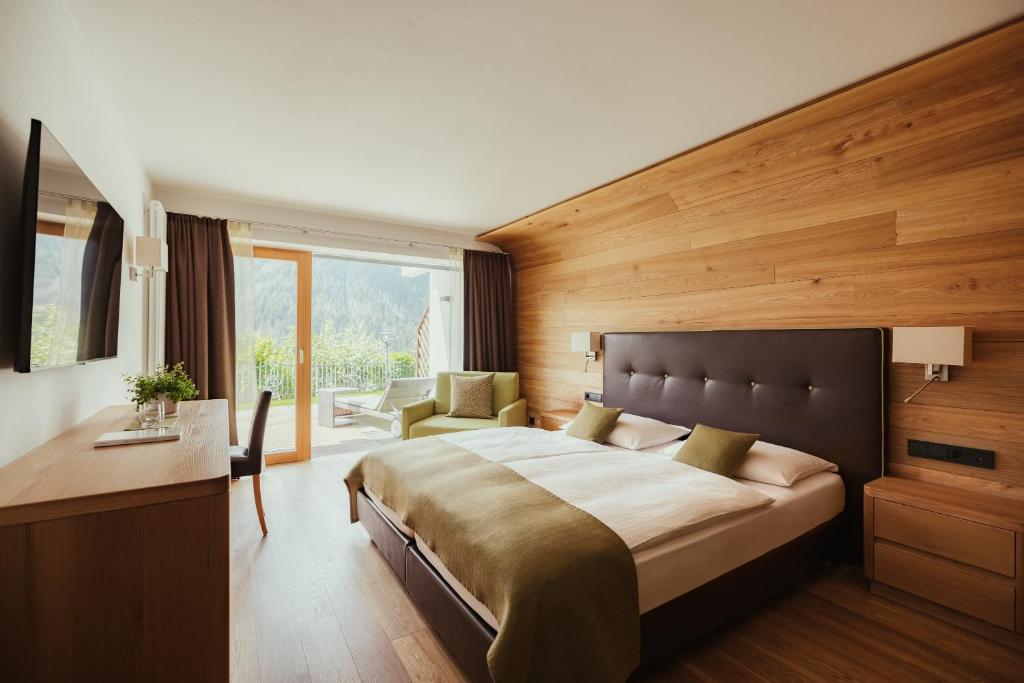 Posteľ alebo postele v izbe v ubytovaní Hotel Grien