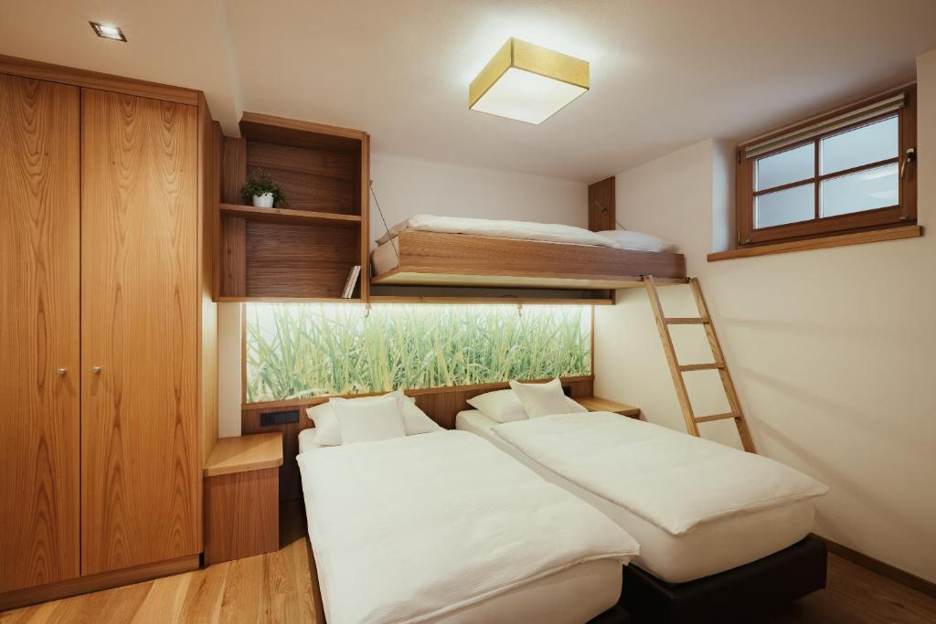 Posteľ alebo postele v izbe v ubytovaní Hotel Grien